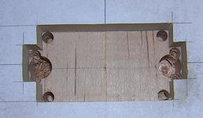 Holes for the pickup screws.
