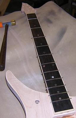 Every other fret hammered into place.