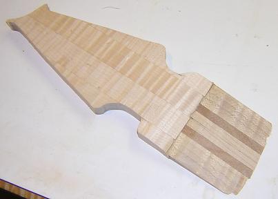 The headstock shape has been cut out.