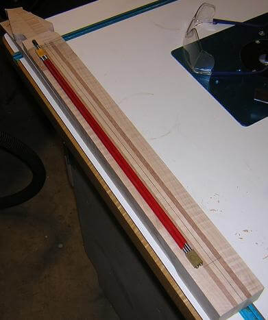 Laying out the markings for the truss rod channel.