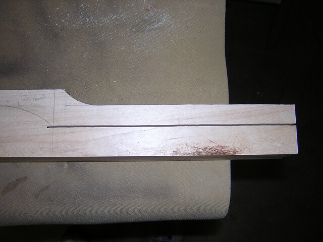 Cutting the headstock to proper thickness.