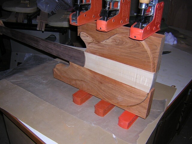 Gluing the body wings to the neck.
