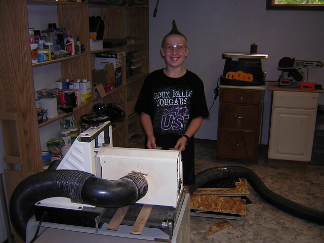 Tundra Boy sanding the walnut laminates to size.