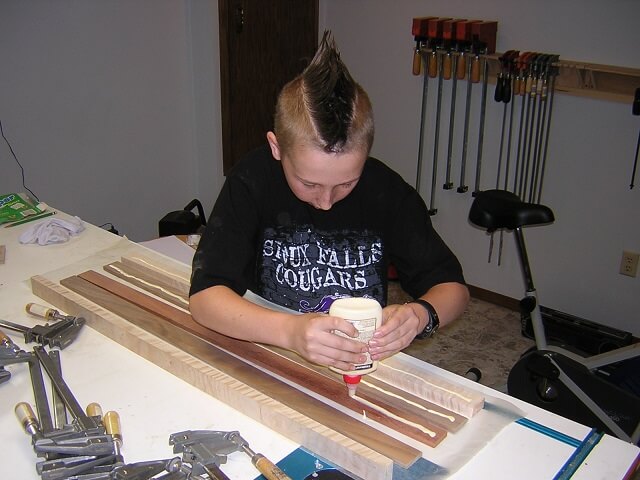 Tundra Boy gluing up the neck blank.