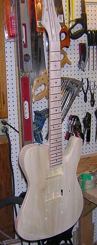 A place to hang the guitar while drying is very handy.