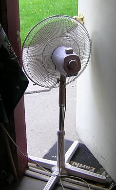 A fan in the doorway is the minimum ventilation you should have.