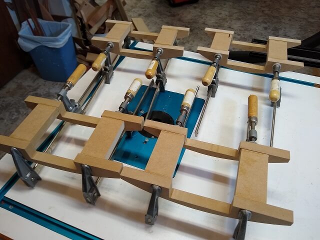 The radius sleds being glued together.
