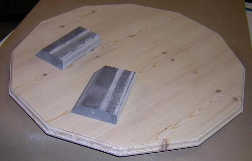 Sanding the routed edge.