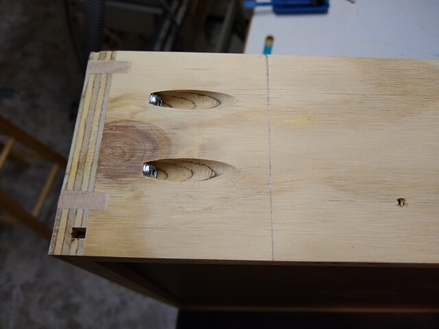 Marking the amount of the drawer to be removed.