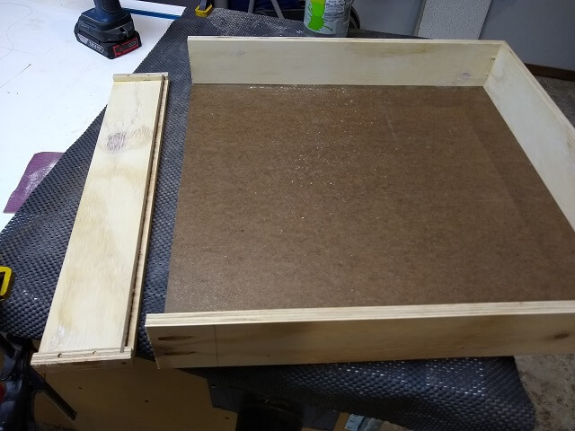 The back of the drawer cut off.