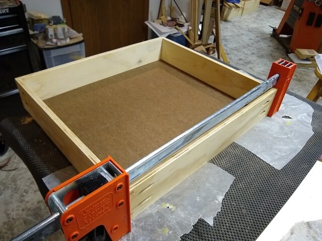 The smaller drawer glued back together.