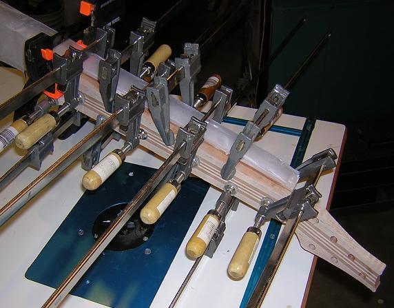 Gluing the fretboard to the neck blank.