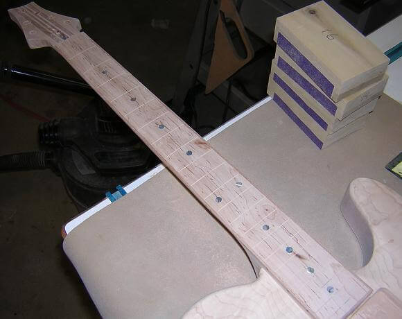 Fretboard radius is done.