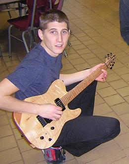 Paul seeing his guitar for the first time.