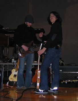 Rebecca St. Jame's guitarist checking out the baritone.