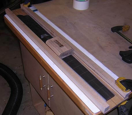 Sanding the radius into the fretboard.