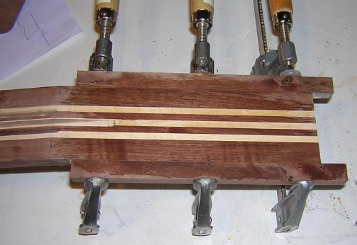 Gluing the headstock ears to the neck blank.