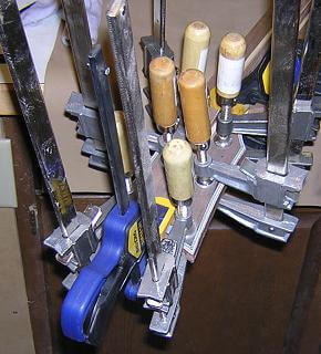 Gluing the headstock faceplate to the neck blank.