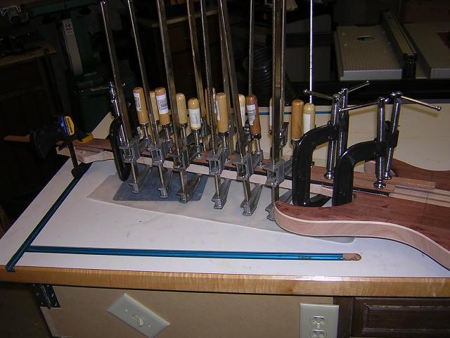 Gluing the fretboard to the neck.