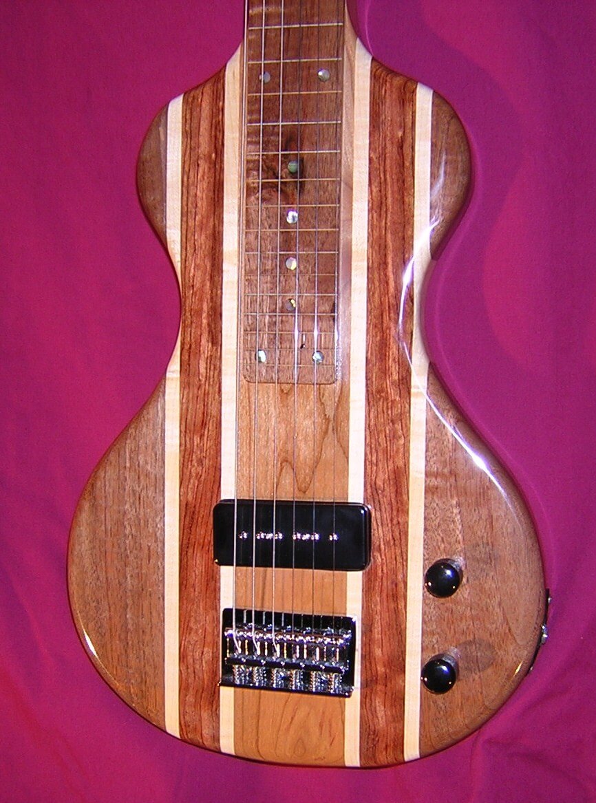 Steel wood guitars hotsell