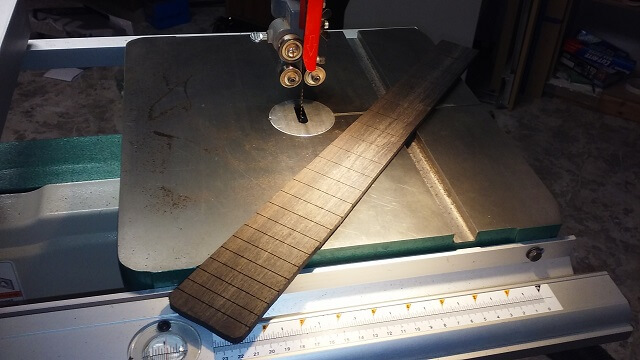 Rough cutting the fretboard to shape.