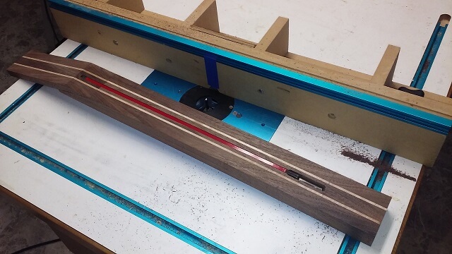 Routing the channel for the truss rod.