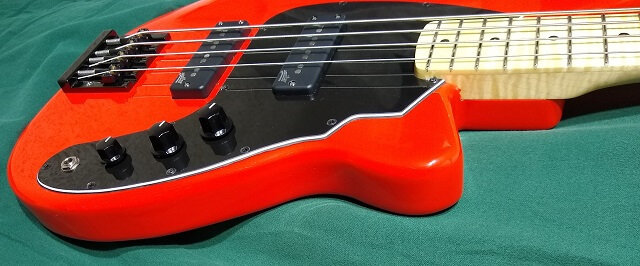 A close up of the controls and the bolt on neck.