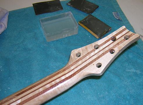 Sanding the neck.