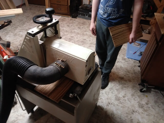 Sanding the zebrawood to thickness.