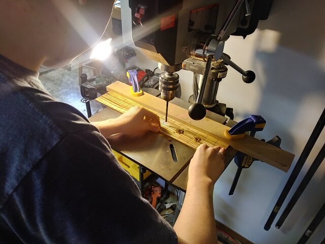 Drilling holes for the fretboard dots. Again.