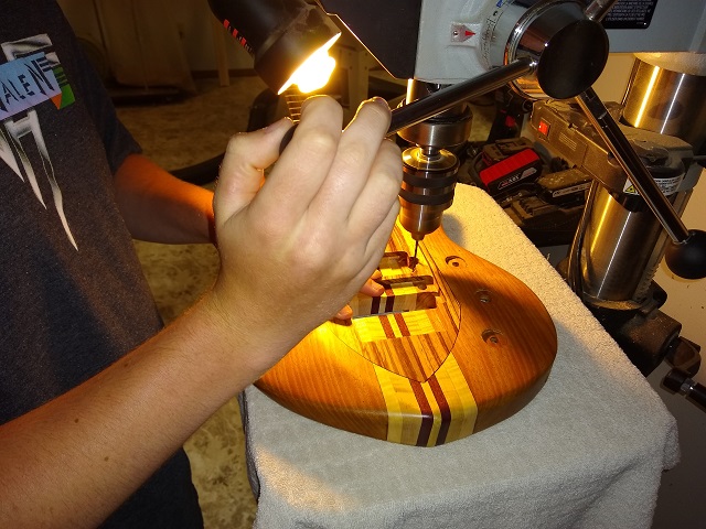 Drilling the pickup mounting holes.