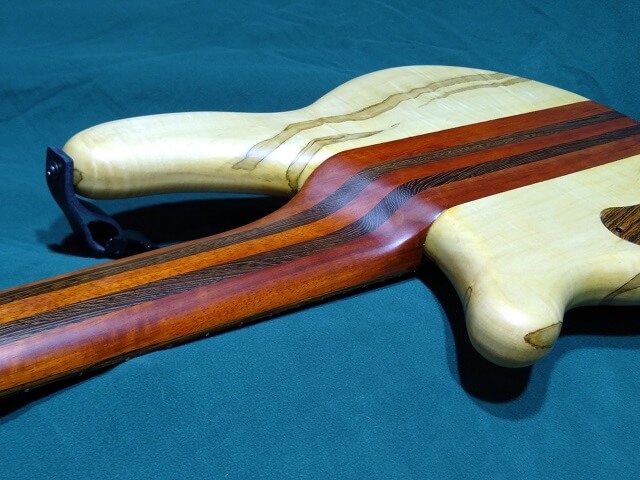 A closeup of the rear neck carve.