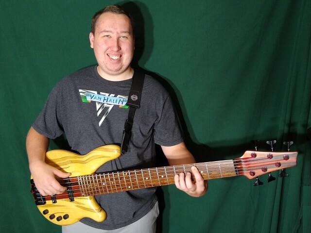 The Tundra Boy posing with his instrument.