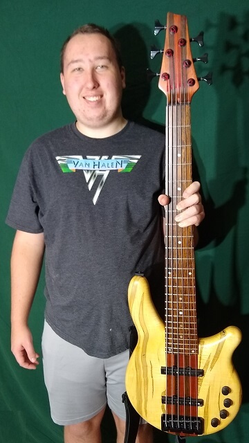 The Tundra Boy posing with his instrument.