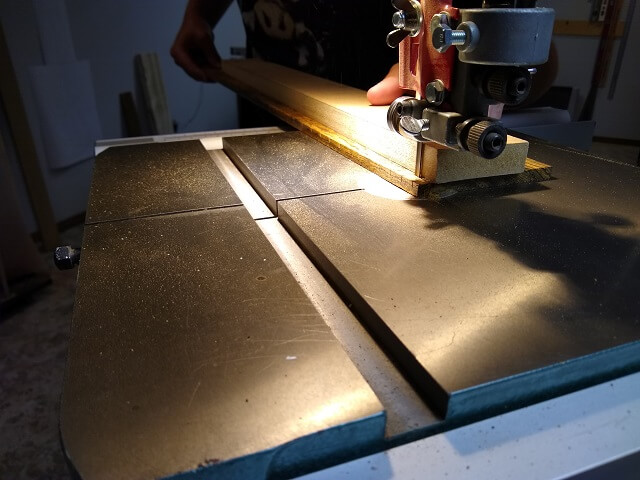 Rough cutting the taper on the other side of the fretboard.