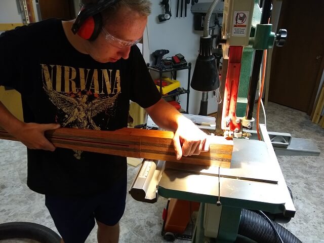 Cutting the back of the neck blank to thickness.