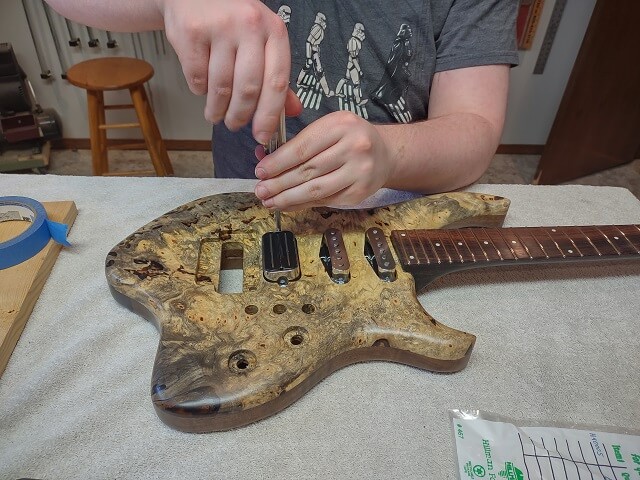 Installing the pickups.