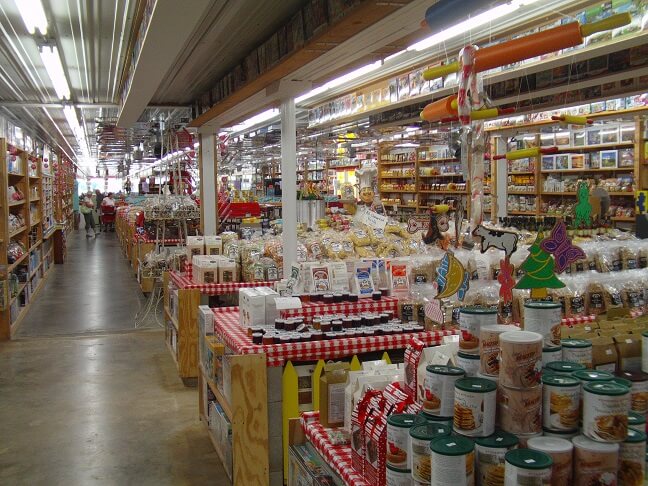 The apple section inside the candy store.