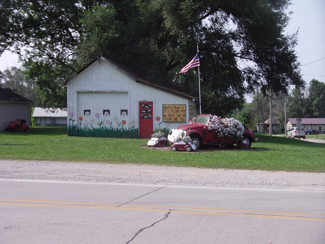 An old Volkswagen which is now a flower planter in Unionville, IA