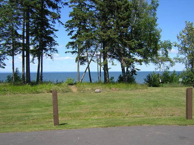 The lake was often visible through the trees as I rode the coast.