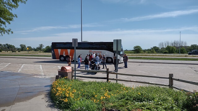 A crowd of people looking at my motorcycle.