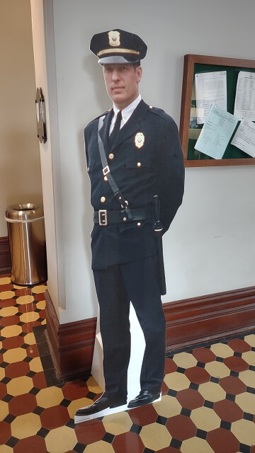 A cardboard cutout of Byron Hadley from the Shawshank Redemption movie.