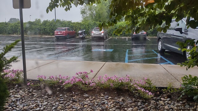 Rain pouring down on my motorcycle in Goshen, IN