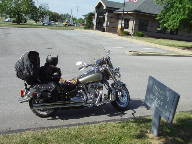 Taking a rest break in a bank parking lot.