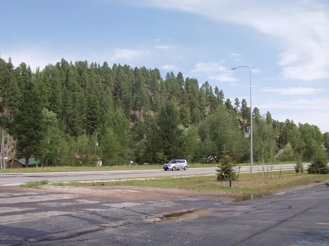 Starting to rain even though blue sky was visible.