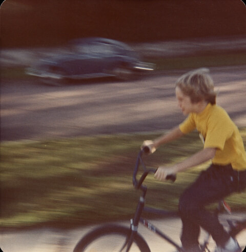 My brother tearing down the sidewalk on my Murray Eliminator