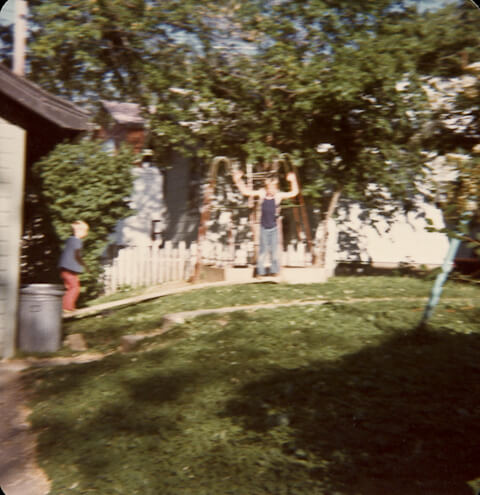 Me jumping off the monkey bars and propelling my brother into the air