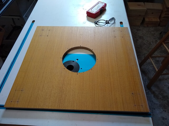 Marking and drilling the holes for the casters.