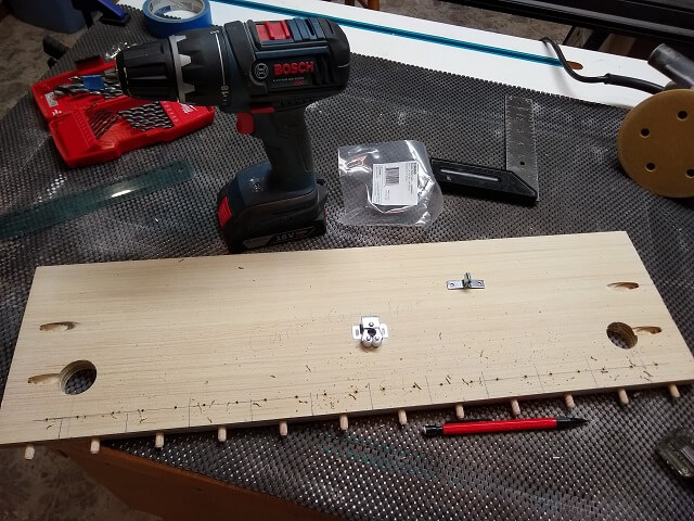 Holes drilled for the roller catches.
