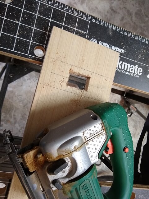 The hole cut for the cord jack plate.